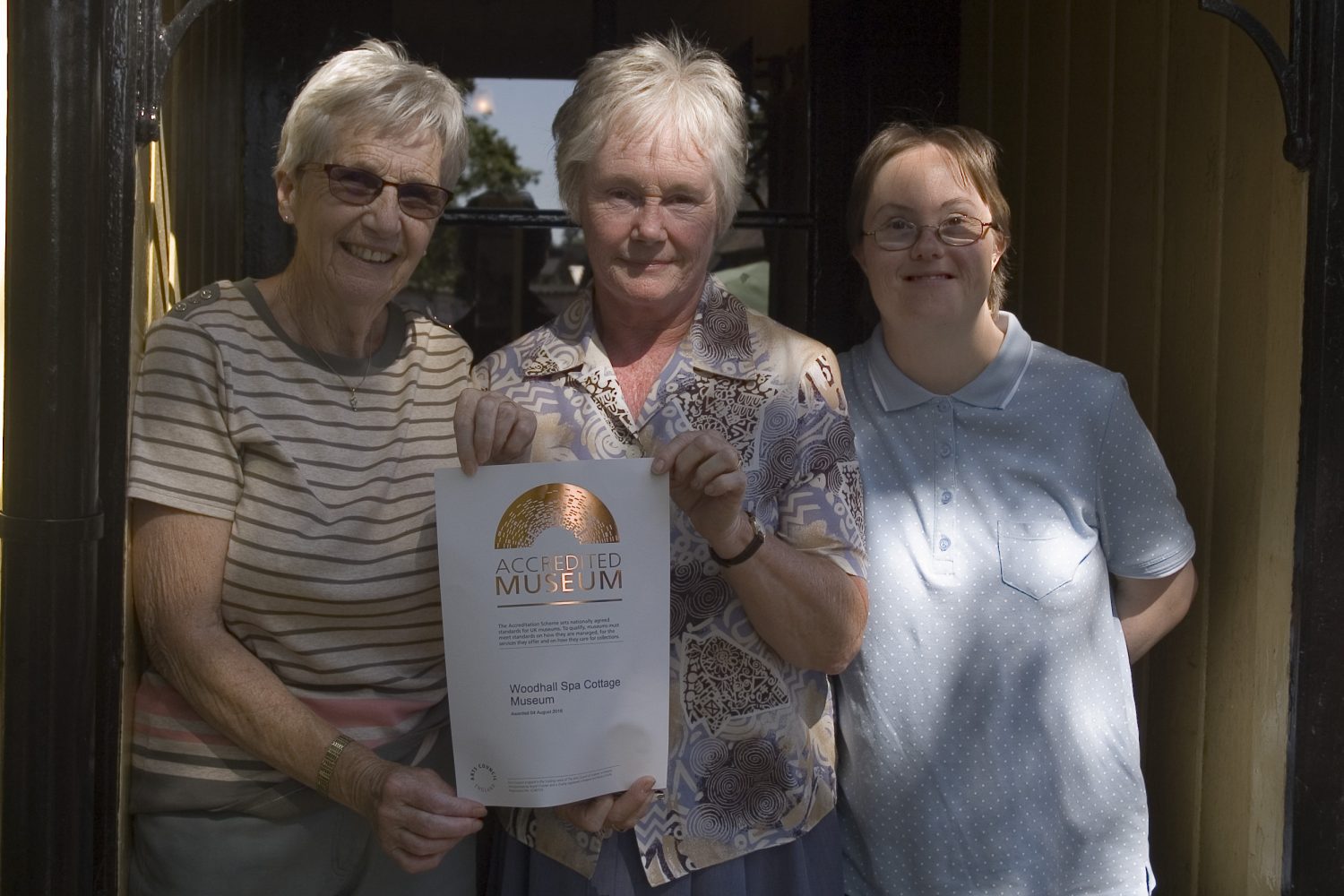 Gill, Patricia and Jenny with the Arts Council England Accredited Museum Certificate