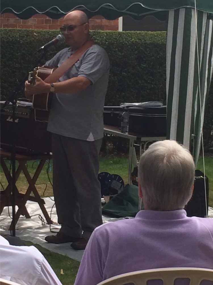 Entertainer Alan Bolt playing music in the garden to the delight of our visitors.